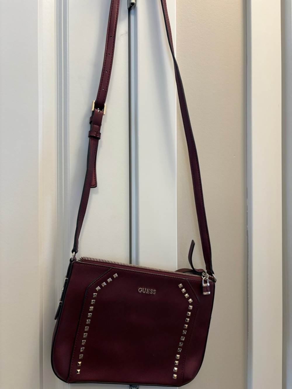GUESS Wine Red Crossbody with Silver Stud Accents